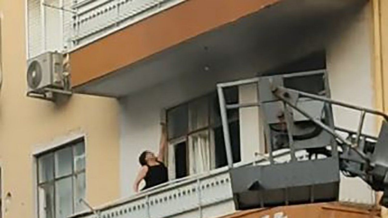 Sinir krizi geçiren kadın evinin balkonunu yaktı, camları kırıp eline ne geçtiyse sokağa fırlattı