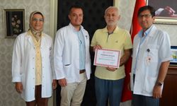 30 yıllık hizmete teşekkür plaketi