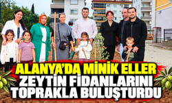 ALANYA’DA MİNİK ELLER ZEYTİN FİDANLARINI TOPRAKLA BULUŞTURDU