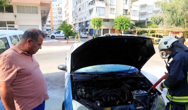 Aracının yanışını çaresiz gözlerle izledi